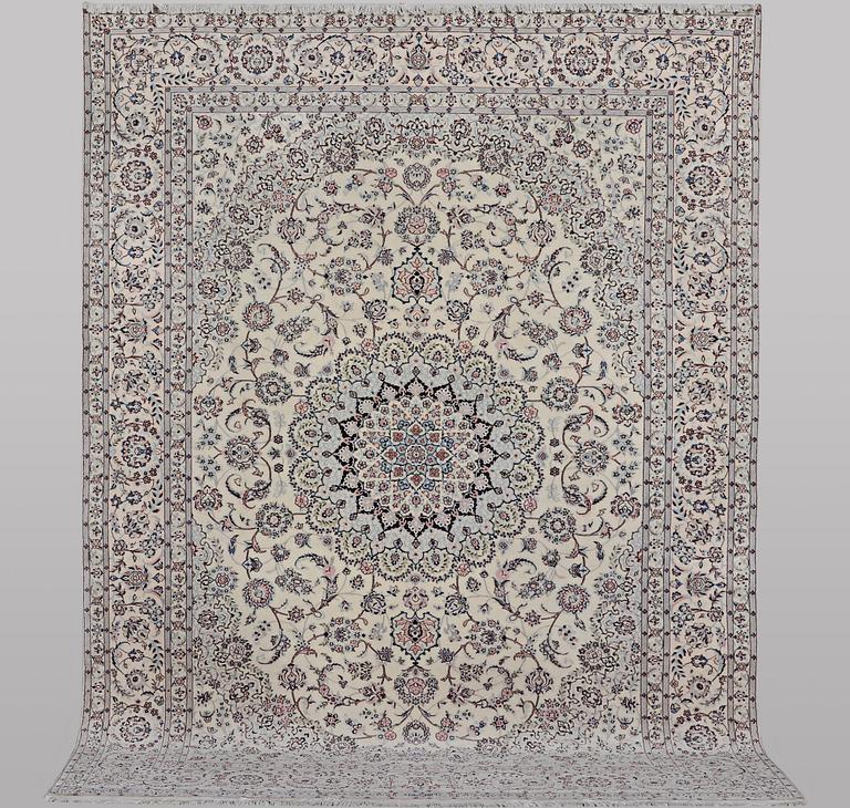 A carpet, Nain, part silk, ca 341 x 245 cm.