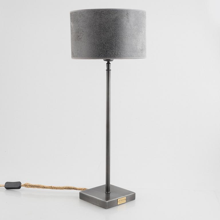 A pair of "Pewter" table lamps with different lampshades from Artwood.