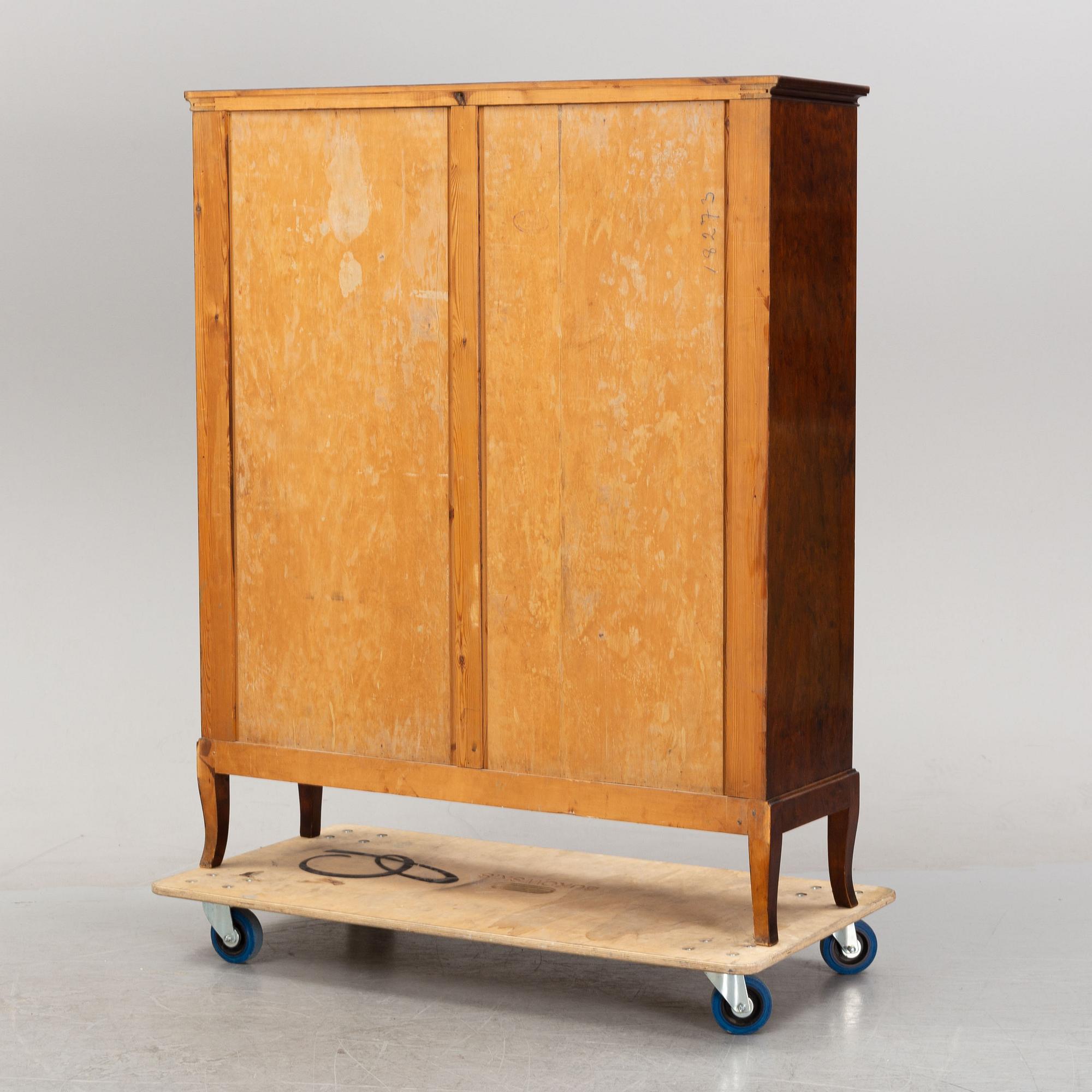 A stained birch cabinet, 1920's.