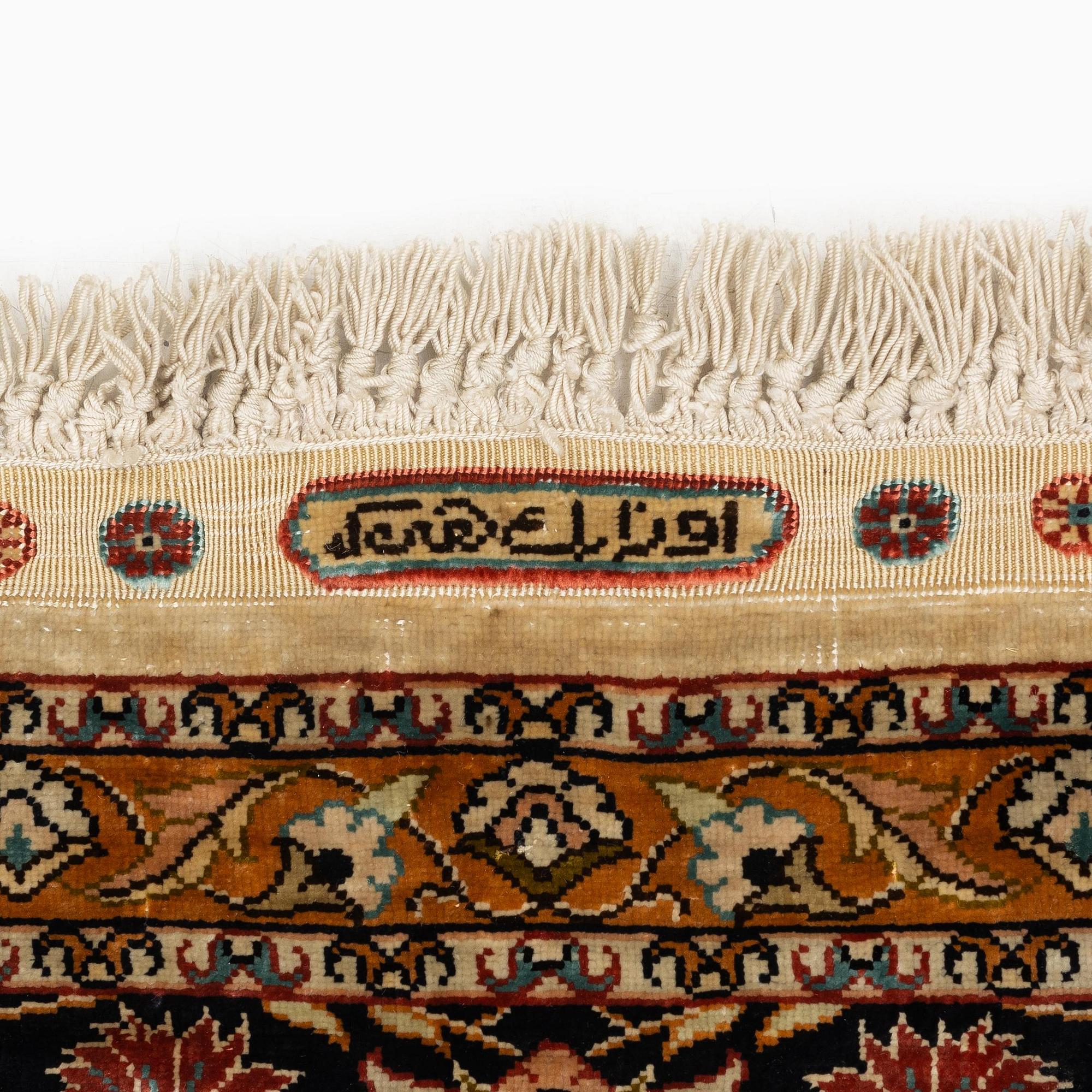 A semi-antique/old pictoral silk Hereke rug, West Anatolia, c. 152 x 103 cm.