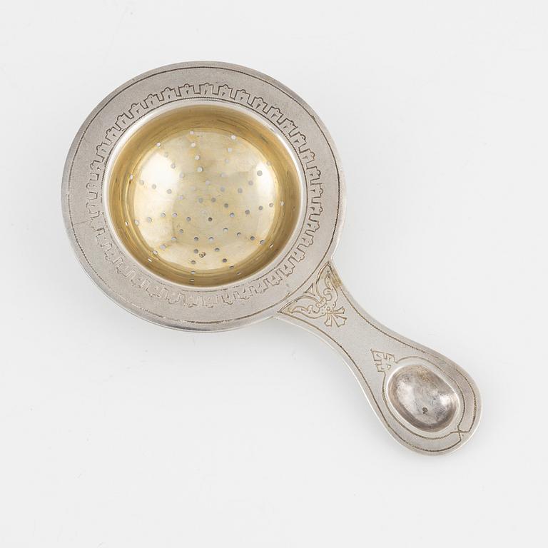 A Russian Parcel-Gilt Silver Tea Strainer, late 19th Century.