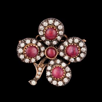 961. A ruby and diamond pendant.