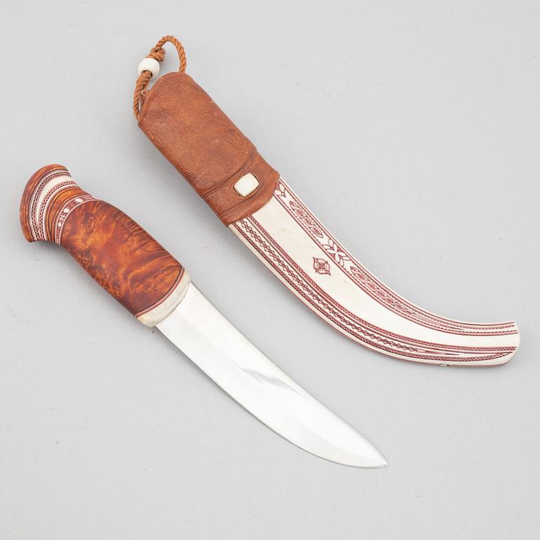 Erik Fankki, a reindeer horn knife, signed and dated 2004.