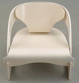 A Joe Colombo white lacquered easy chair, model no 4801, Kartell, Italy 1960's.