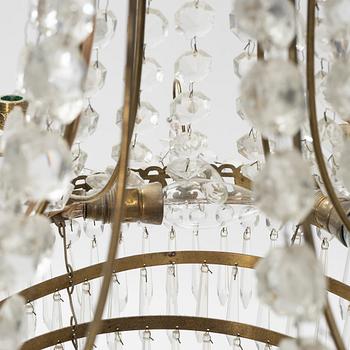 An Empire style chandelier, later part of the 20th Century.