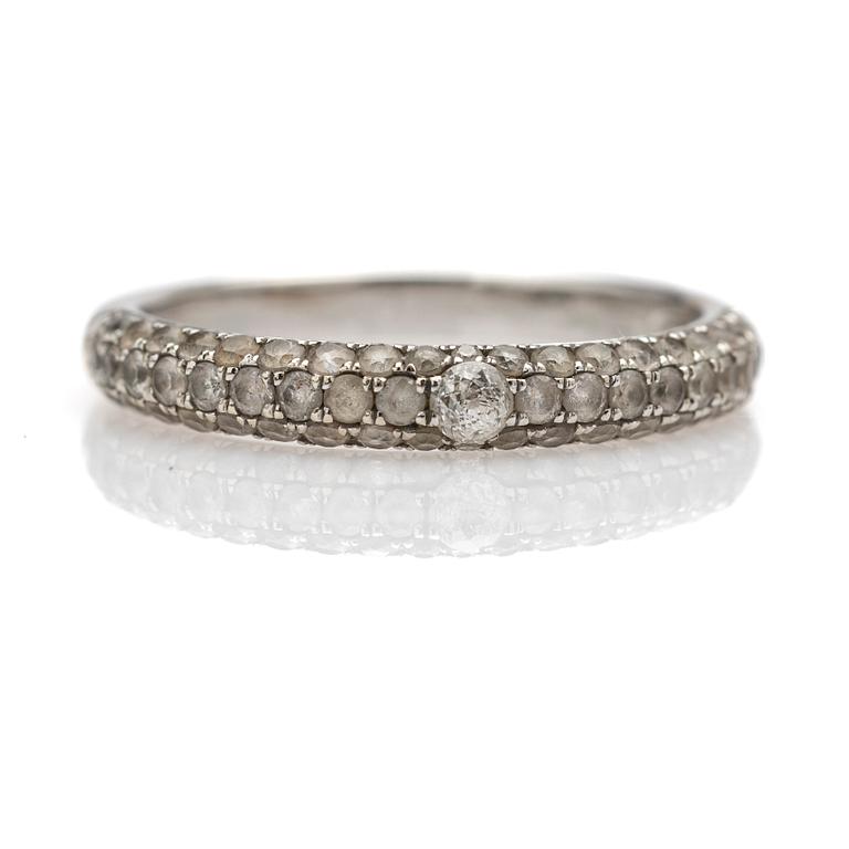 Ring, 14k white gold with brilliant-cut diamond and white stones.