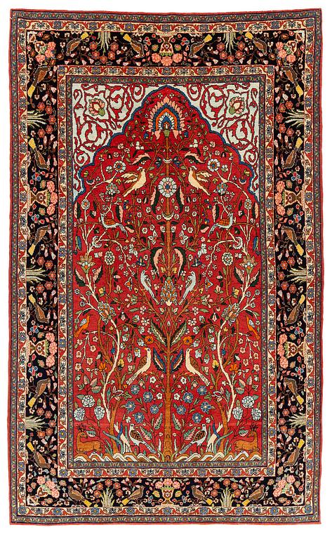 An antique 'Manchester' Kashan rug, central Persia, c 222 x 133 cm.