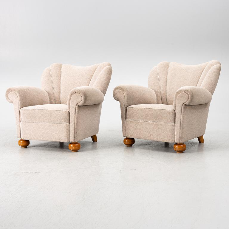 A pair of Swedish modern armchairs, first half of the 20th century.