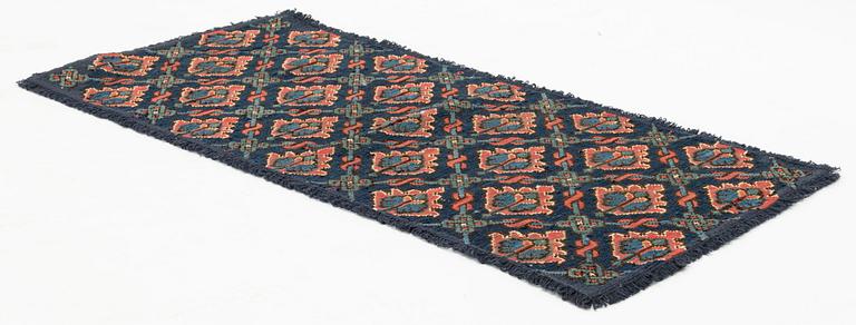 An embroidered carriage cushion, c. 100 x 49 cm, Bara district, Scania signed BID and dated 1787.