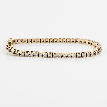 Tennis bracelet, 18K gold with brilliant-cut diamonds.