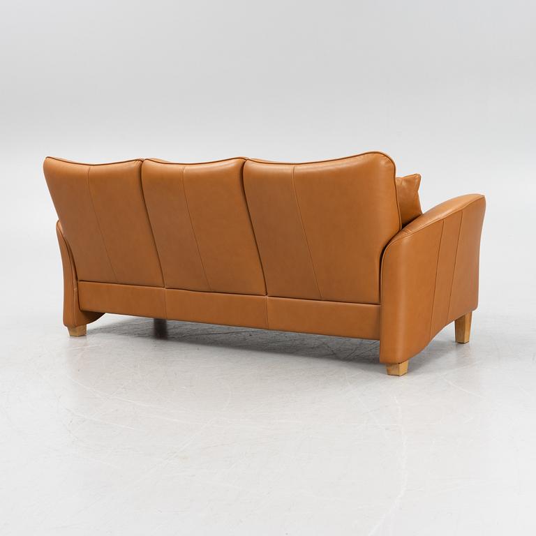 A 'Fia' leather upholstered sofa from Brunstad, 21st Century.