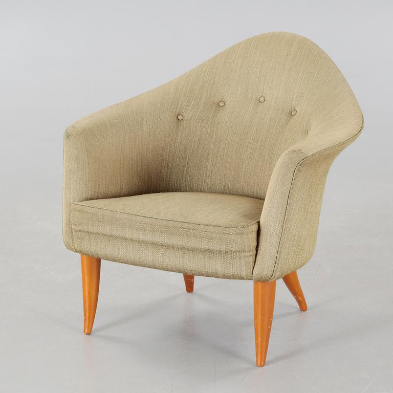 A 'Lilla Adam' easy chair by Nordiska Kompaniet.