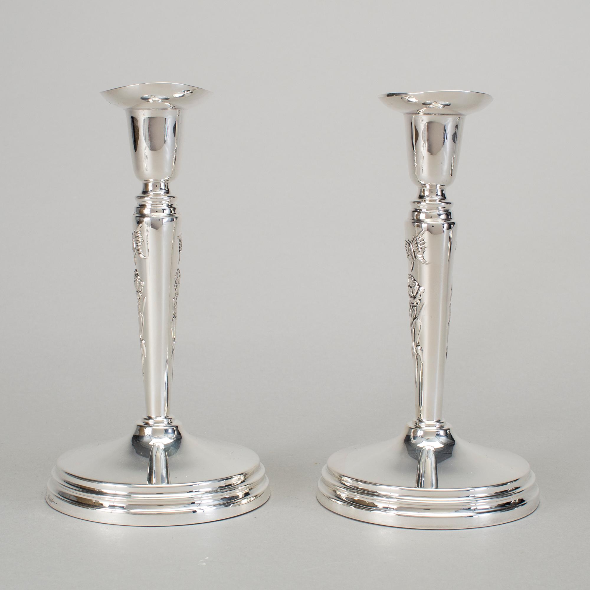 A pair of silver candlesticks by Meya Lerible for Mema, Linköping 1994.