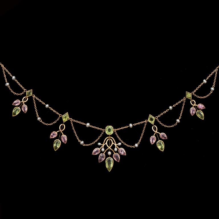 A pearl, peridote and pink tourmaline necklace. Circa 1900.
