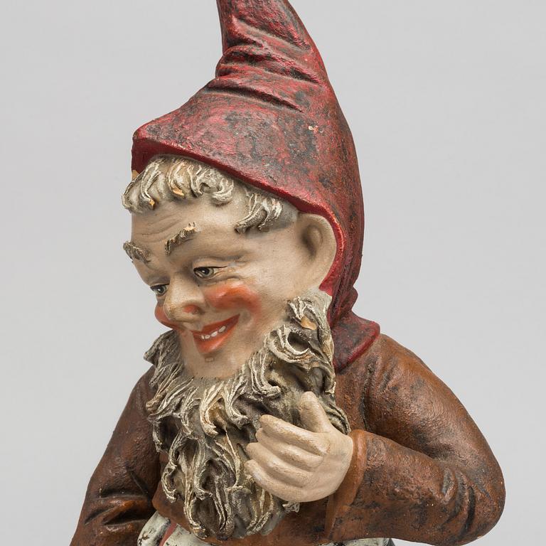 A painted terracotta gnome early 1900's.