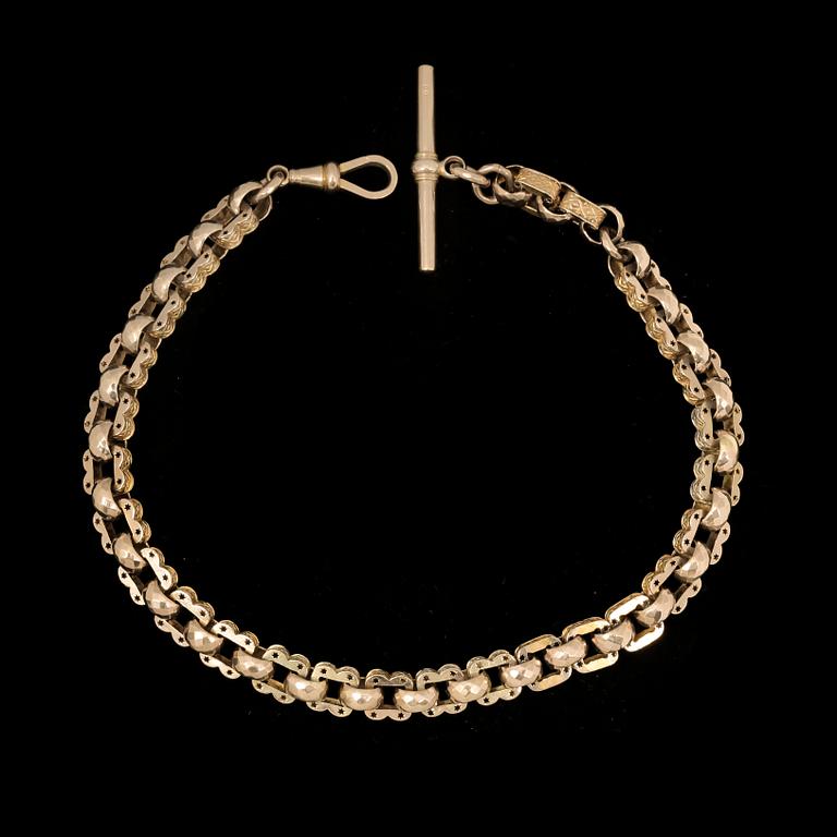 KLOCKKEDJA, 9k guld, trol England, omkring 1800/1900. Vikt 34,2g.