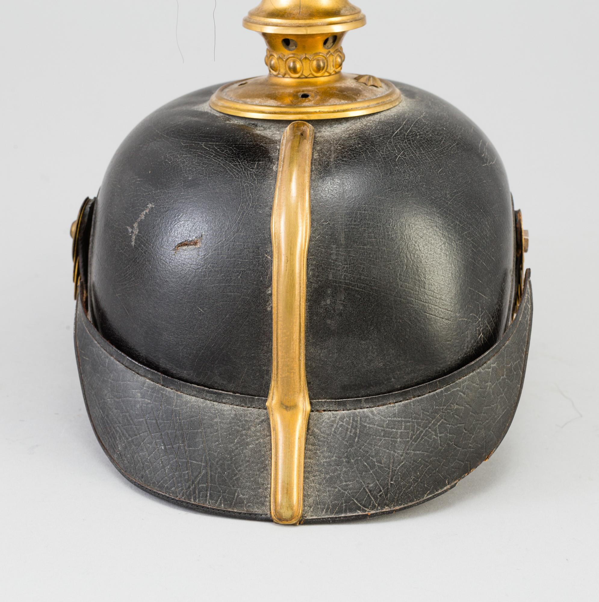 A Swedish military 
officer helmet m/1894.