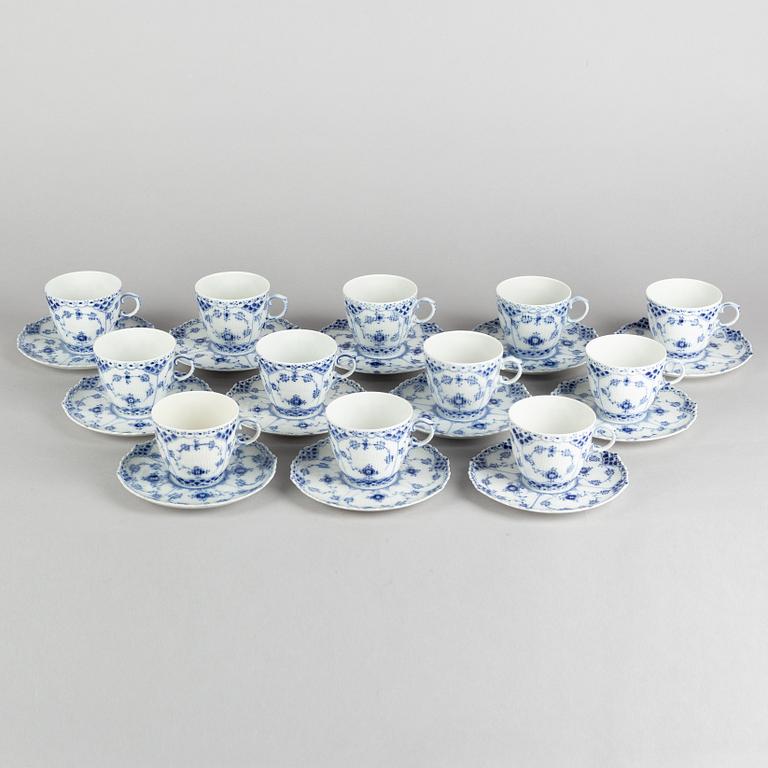 A set of twelve 'Blue Fluted Half Lace' porcelain coffe cups and stands, Royal Copenhagen, model 1035, 20th century.