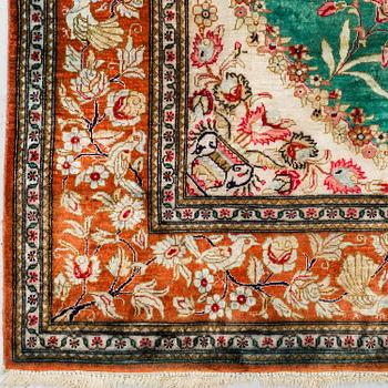 A RUG, silk Qum, probably, ca 145 x 100 cm.