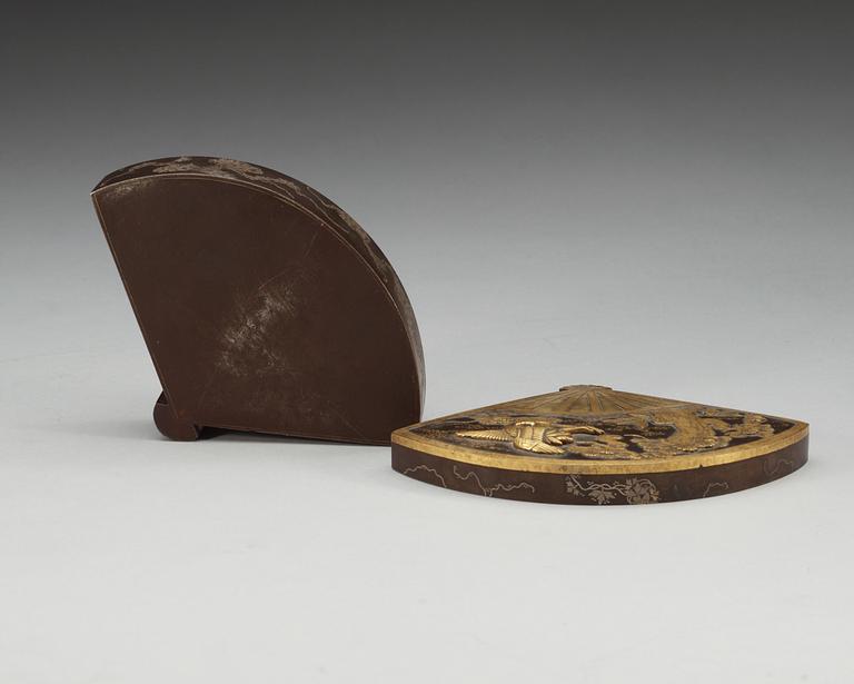 A Japanese fan-shaped gilt and silvered bronze box with cover, Meiji, circa 1900.