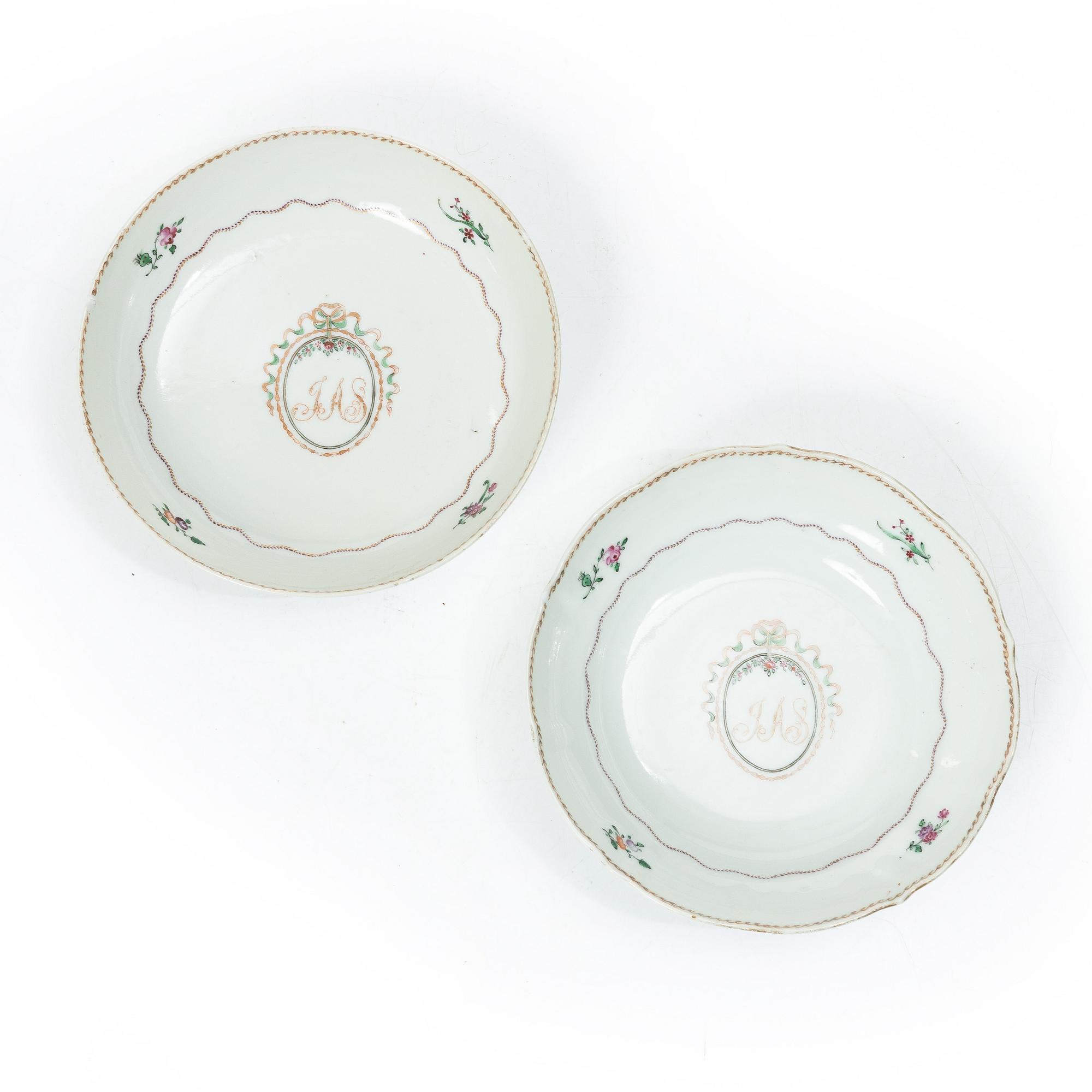 Cups and saucers, 11+7, and a teapot in famille rose with monogram, company porcelain, China, 18th century.