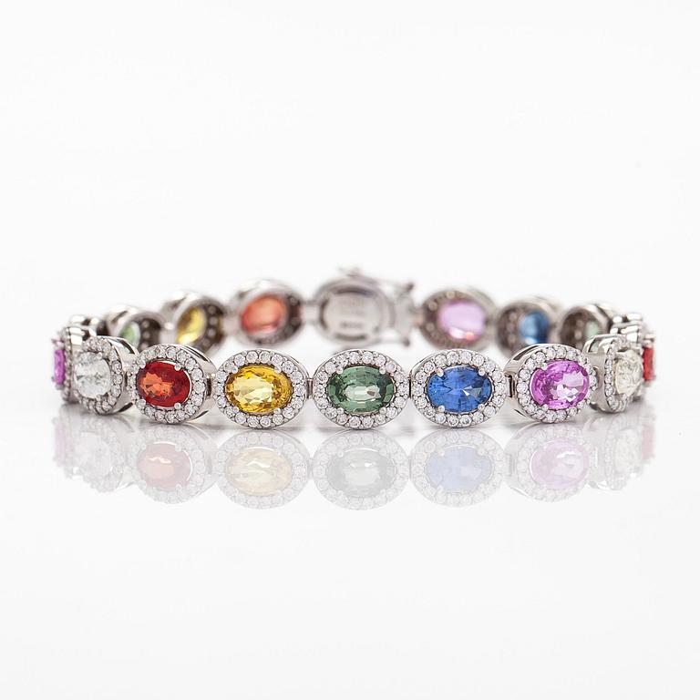 A multi-colour sapphire and diamond bracelet in 14K whitegold.