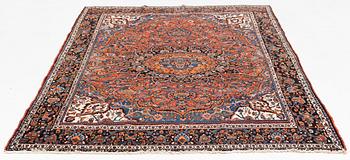 A semi-antique Abadeh carpet, approximately 296 x 191-196 cm.