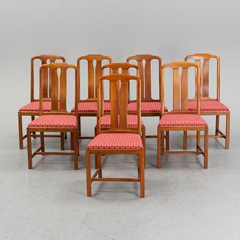 An 'Ambassadör' dining table with eight chairs by Carl Malmsten, second half of the 20th Century.