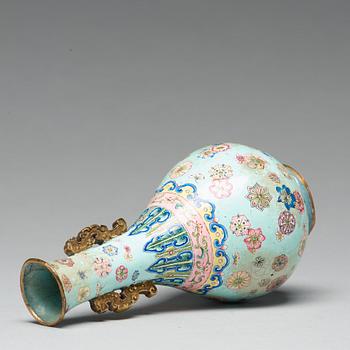 A painted enamel on copper vase, Qing dynasty, 18th Century.