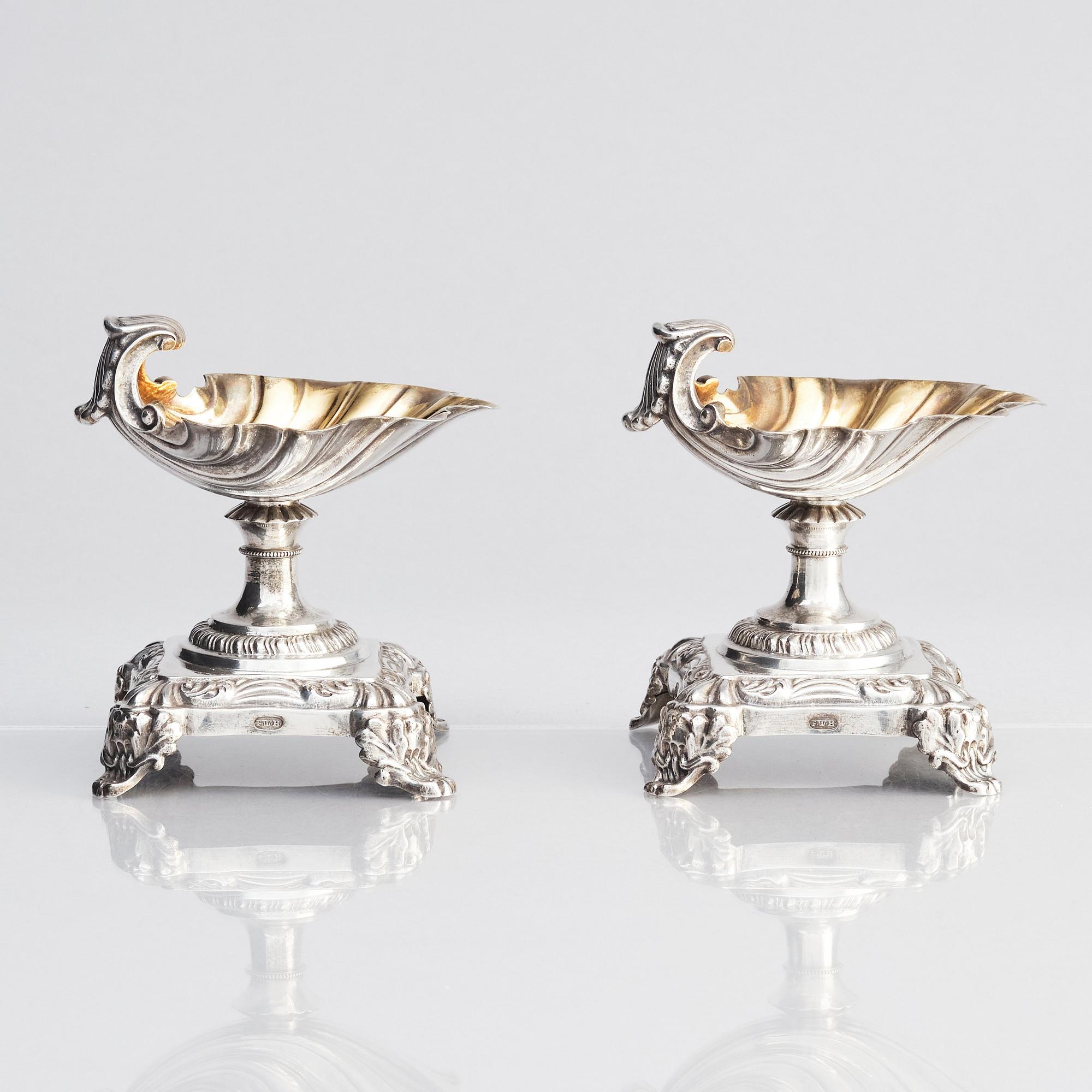 A Swedish pair of salt cellars, parcel-gilt silver, marks of Gustaf Möllenborg, Stockholm 1838.
