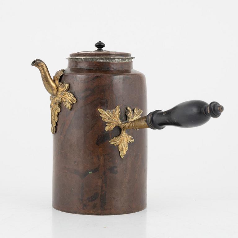A Swedish copper and brass rococo coffee pot, later part of the 18th century.