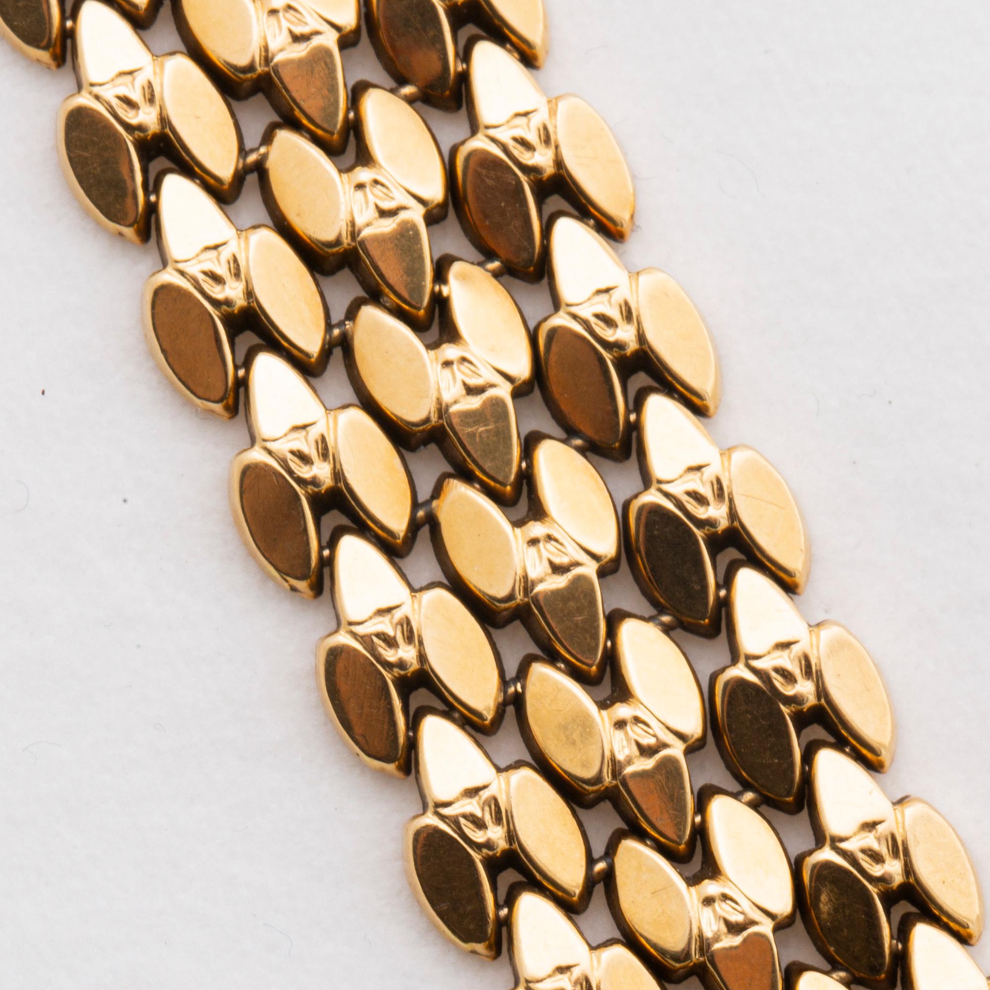 ARMBAND 18K guld.