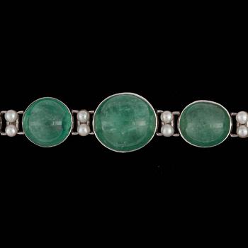 A cultured pearl and cabochon-cut green beryl bracelet.