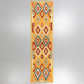 A runner, kilim 302 x 82 cm.