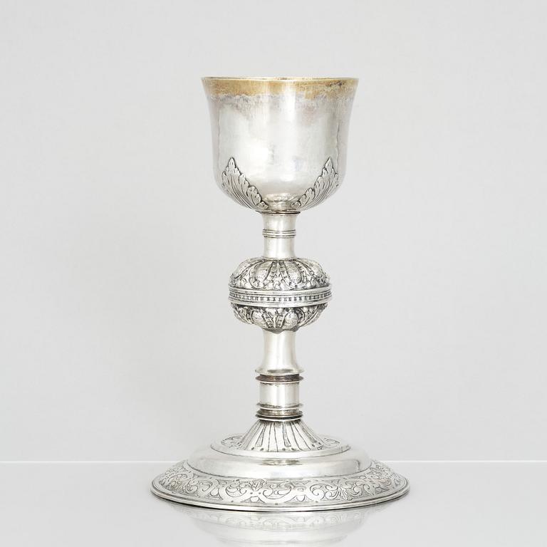 An 18th century parcel-gilt silver cup and paten, unmarked.