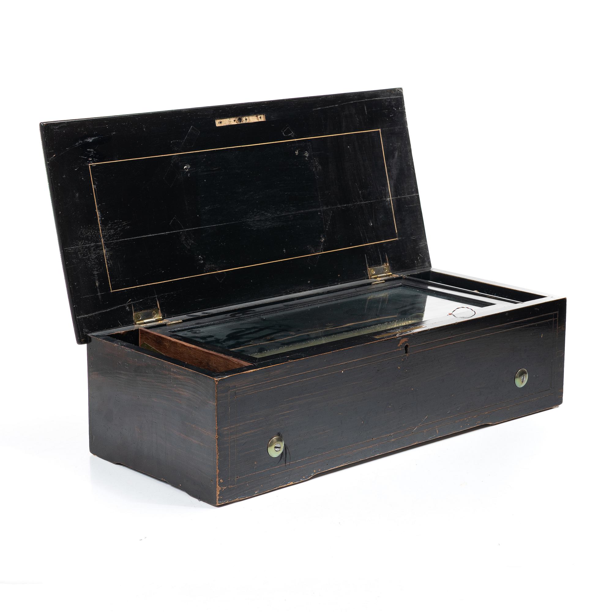 Cylinder music box with six melodies, Switzerland, 1890–1900.