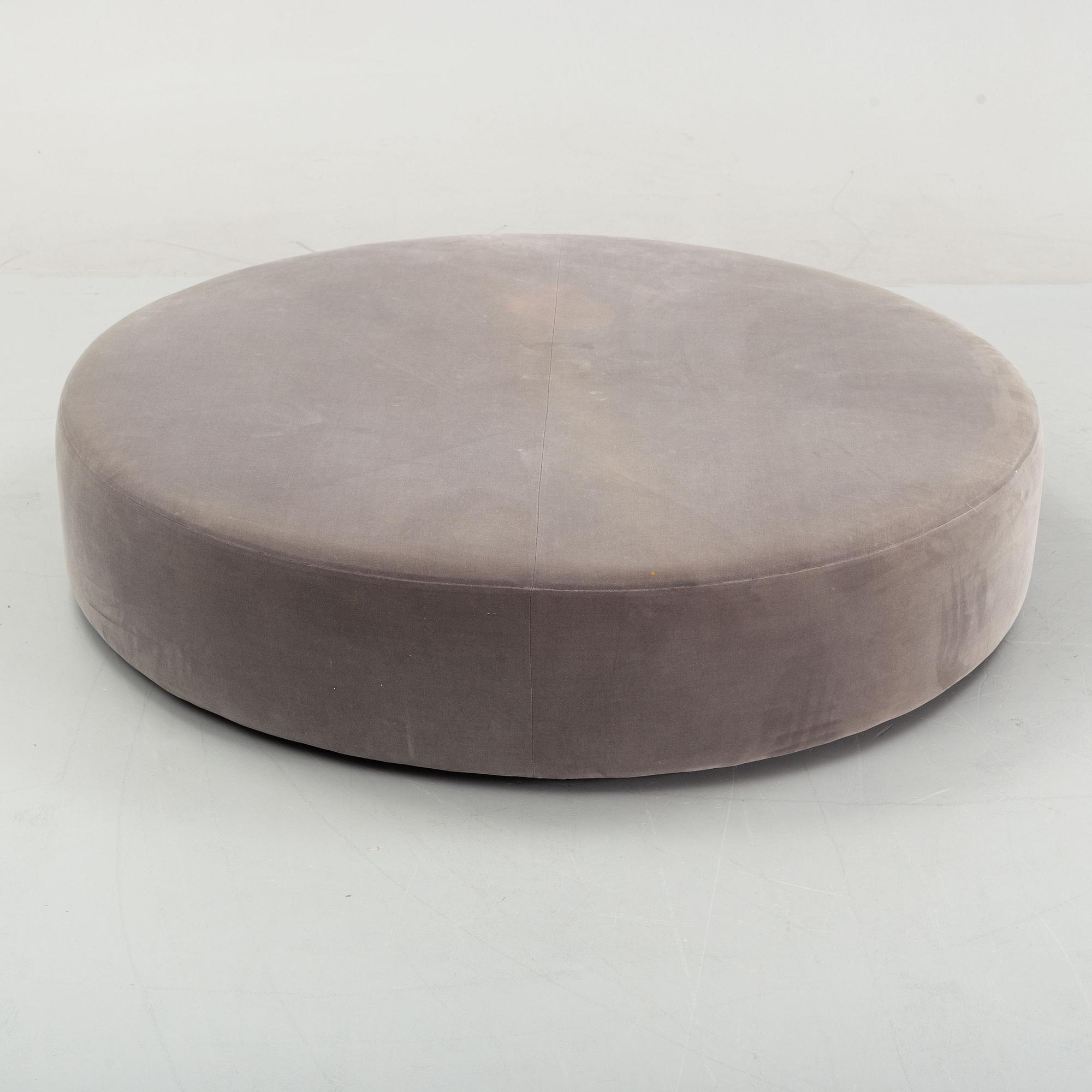 Antonio Citterio, a 'Harry Large' ottoman from B&B Italia.