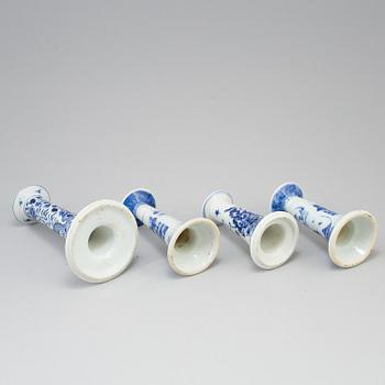 Four chinese 19th century blue and white porcelain candle holders. Qing dynasty.