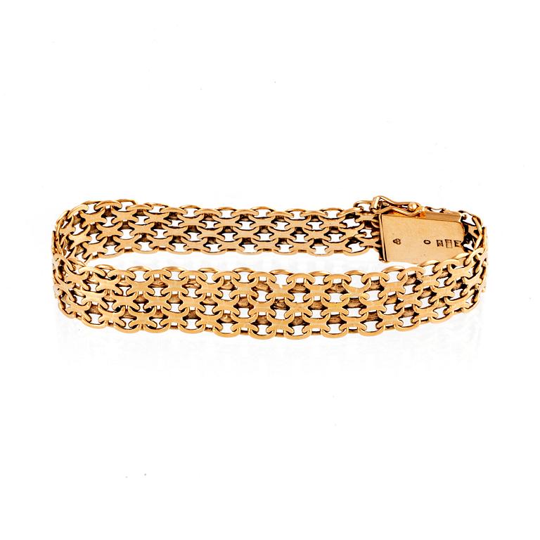 Armband 18K guld X-länk Stockholm 1962.