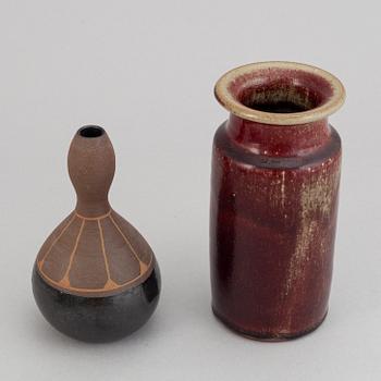 Rolf Palm, a set of two stoneware vases and three stoneware bowls.