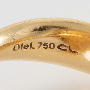 Ole Lynggaard, ring, large Lotus, 18K gold with cabochon-cut black stone probably onyx with brilliant-cut diamonds.