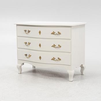 A late Baroque style chest of drawers, 20th Century.