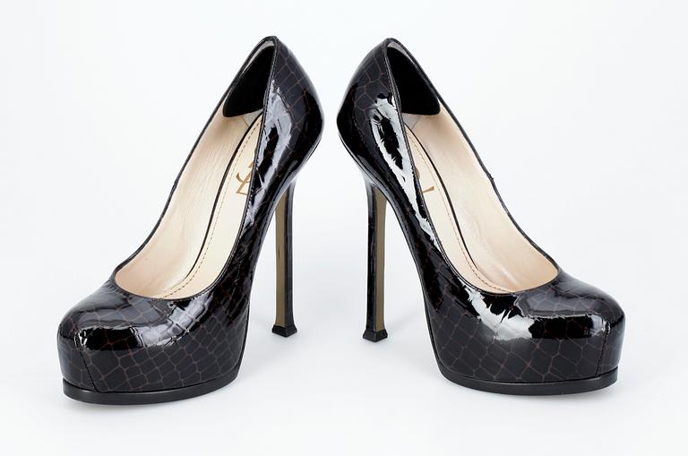 A pair of lady shoes by Yves Saint Laurent.