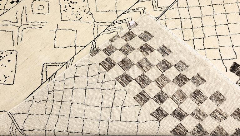 A Moroccan carpet, 295 x 201 cm.