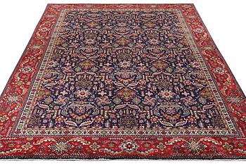 A Tabriz carpet, c. 369 x 277 cm.