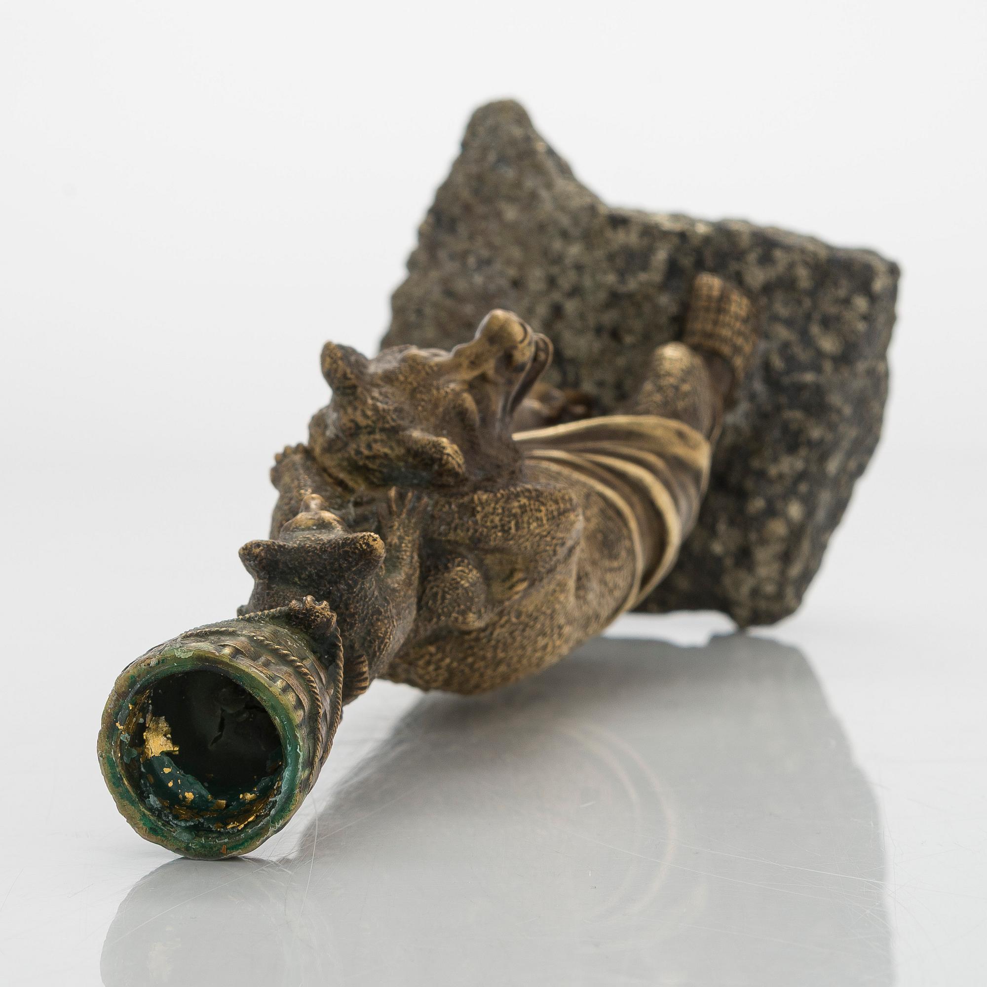A Russian bronze candle holder, circa 1900.