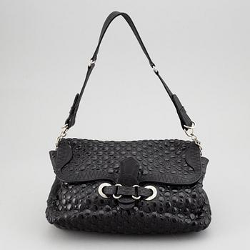 SONIA RYKIEL, a black leather bag.