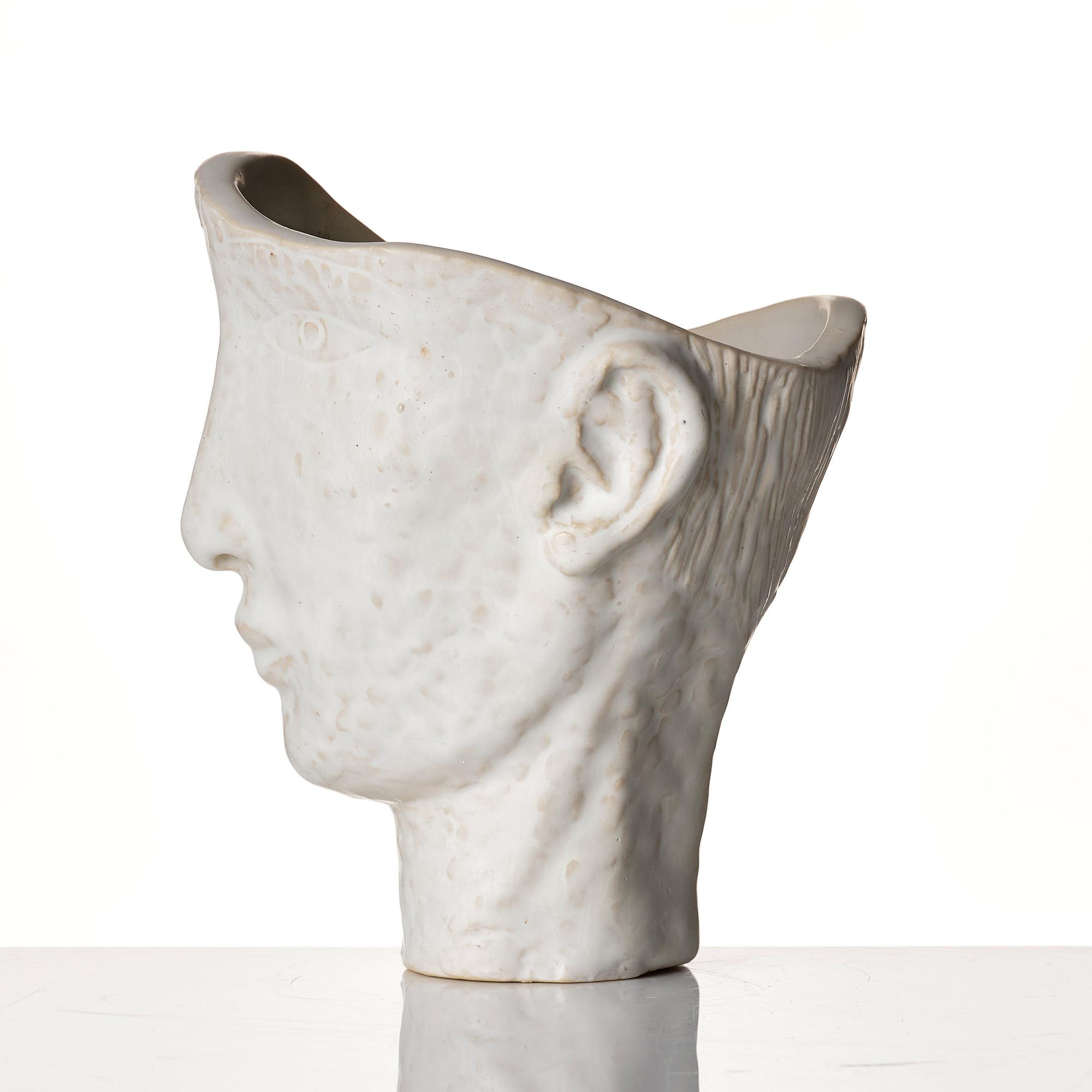 Stig Lindberg, a white glazed stoneware vase of a head, Gustavsberg Studio, probably 1940s.