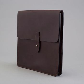 THOMAS SANDELL, a leather bag from Palmgrens.