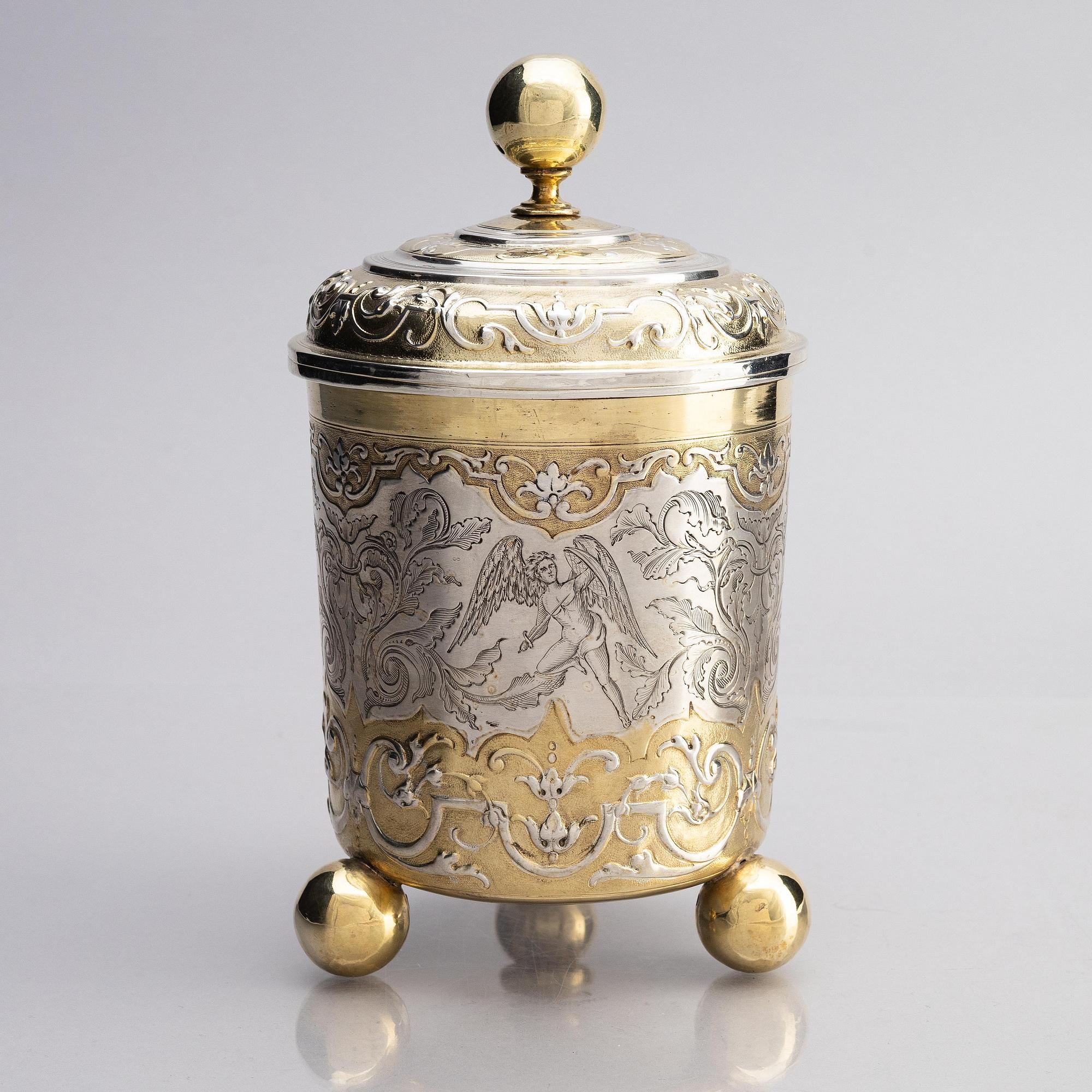 An Augsburg parcel-gilt silver beaker and cover, marks of Philipp Stenglin, Augsburg 1713 - 1717.